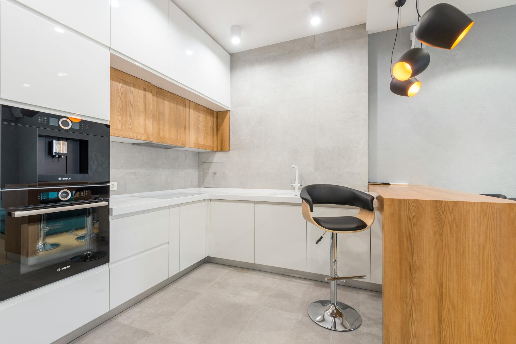 Built-in kitchen appliances and modern cabinetry
